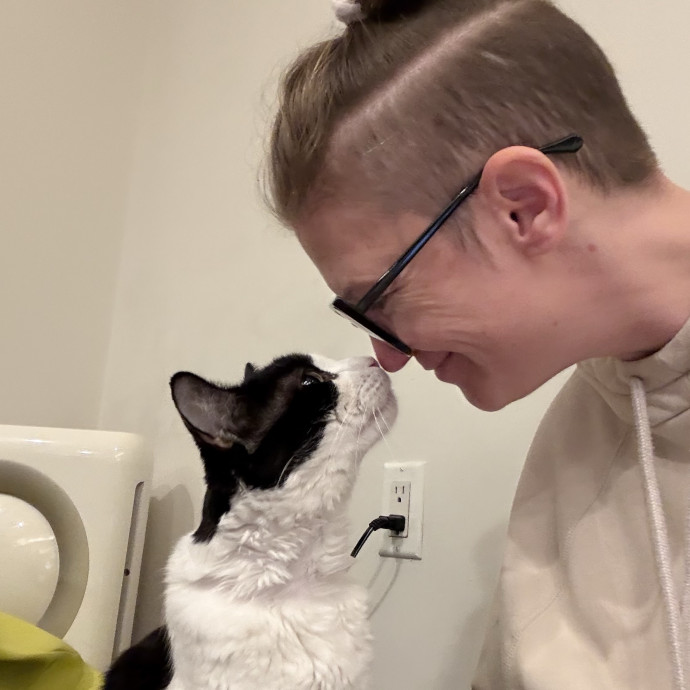 Veteran Cat Sitter - Mosh Pit Enthusiast