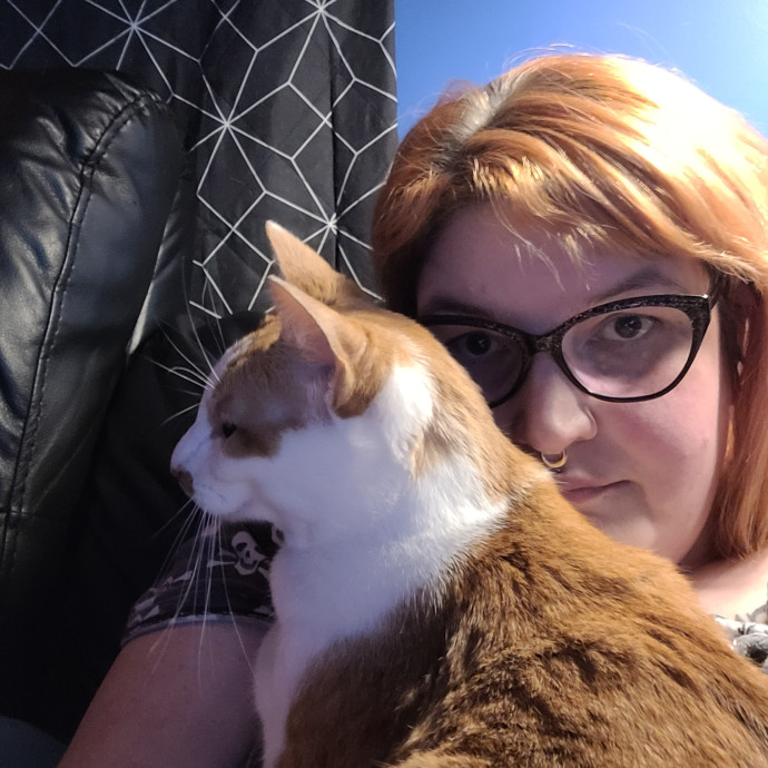 Kitty Sits By Jamie