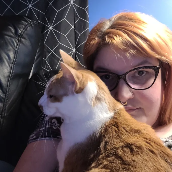 Kitty Sits By Jamie