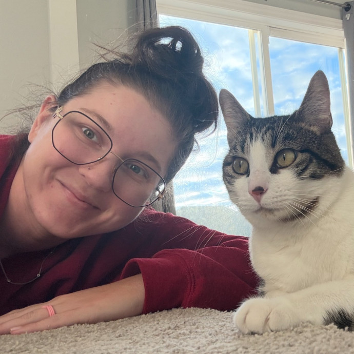 Cat Mom Offering Thoughtful Care