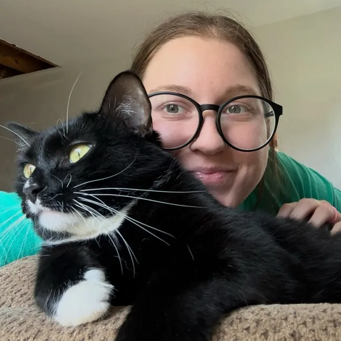 Cat Mom Offering Thoughtful Care