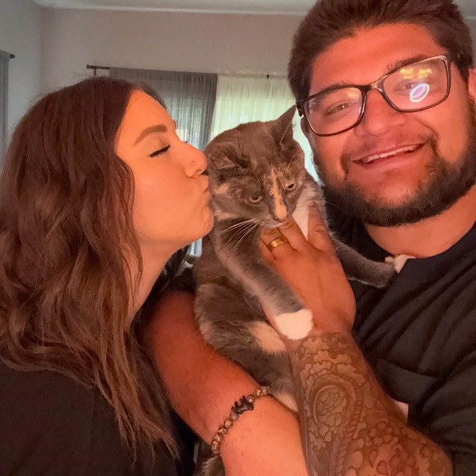 Cat Mom Offering Thoughtful Care