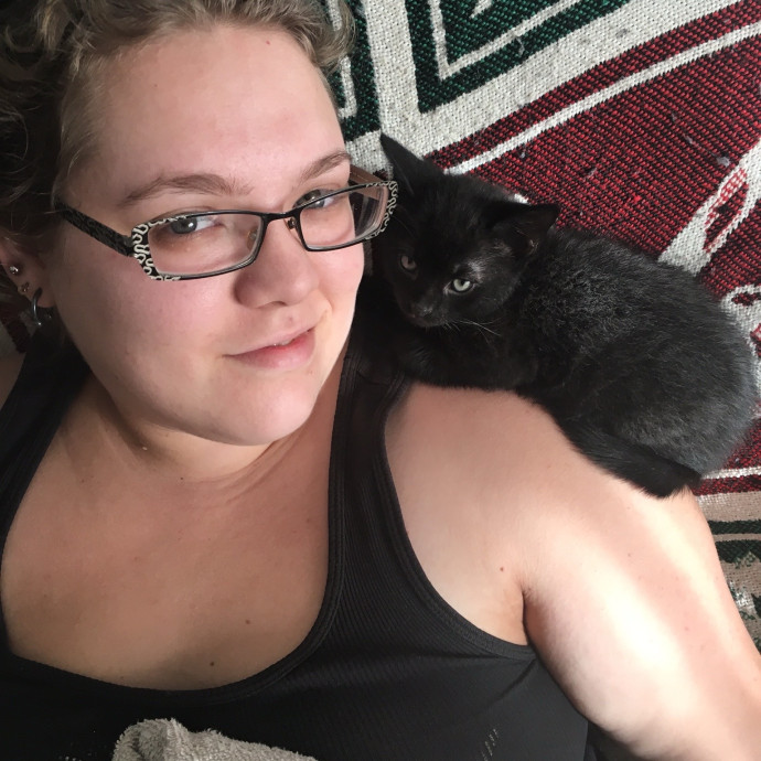 Cat Cuddling Carer photo 3