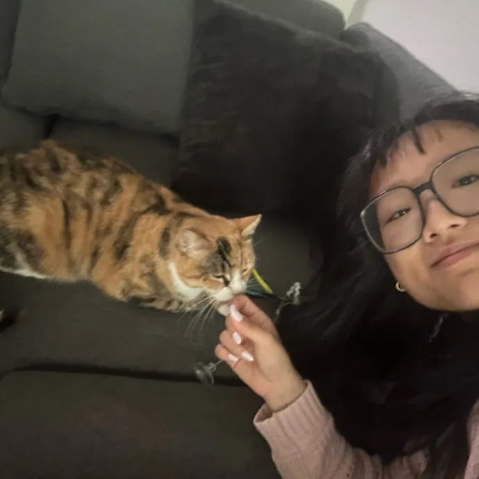 Tenacious Student And Cat Enthusiast