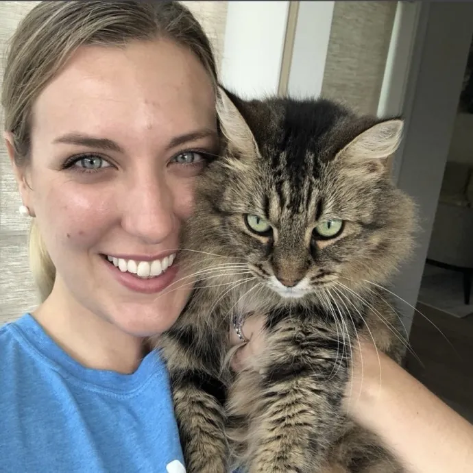 Purr-Fessional Cat Whisperer