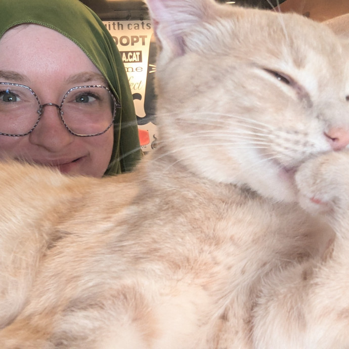 Cat Whisperer And Friend