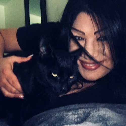 Ady The Cat Sitting Lady