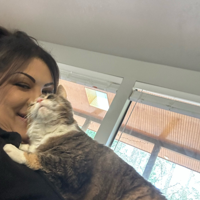 Ady The Cat Sitting Lady