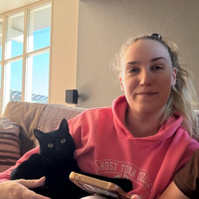 Cat Lover Offering Care photo 3