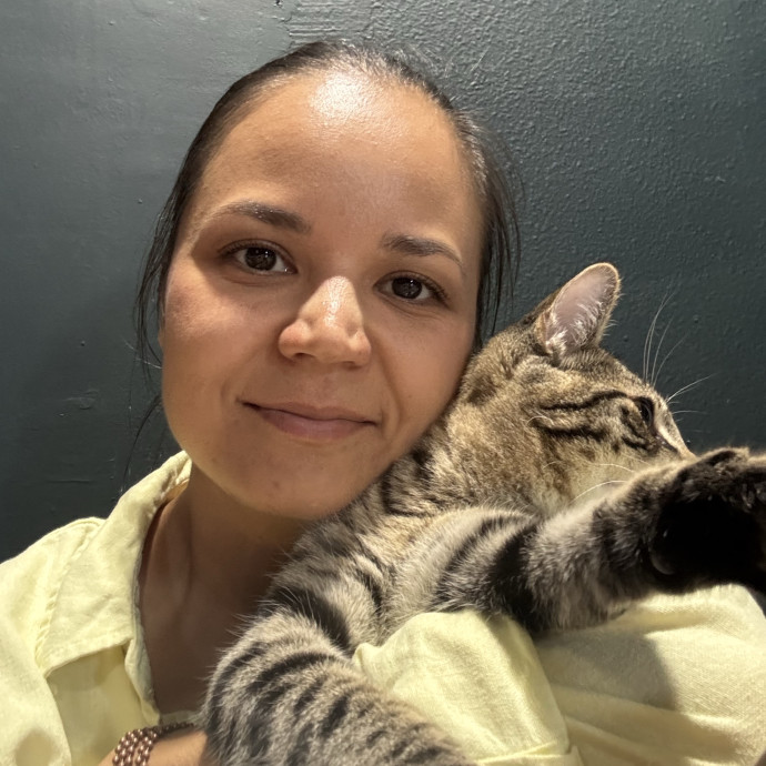 Cat Lover Offering Calm Attentive Care