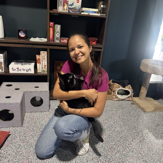 Cat Lover Offering Calm Attentive Care