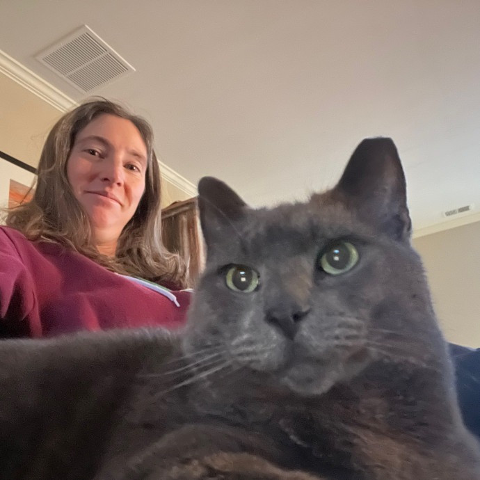 Zookeeper Turned Insured Cat Sitter photo 2