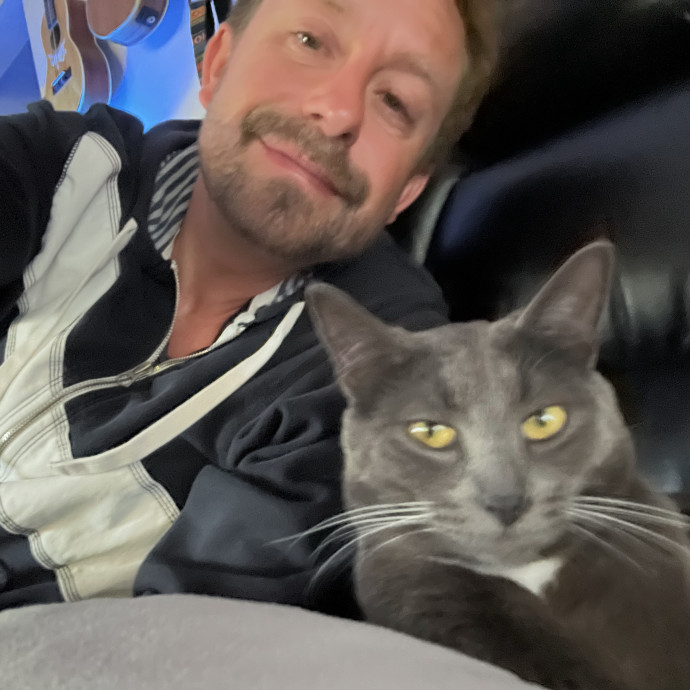 Tenured Loving Ukulele Playing Sitter