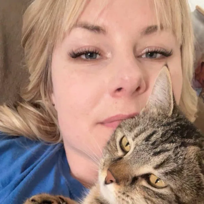 Purr-Fessional Cat Sitter
