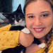 Three Tails Cat Sitting By Amanda