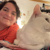 Enjoys Cuddles With Cats