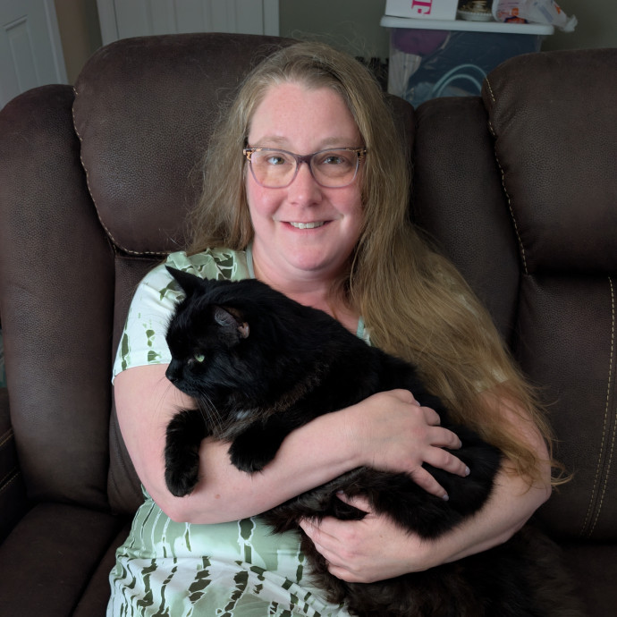 The Adoring Cat Whisperer Lady