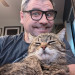 Caring And Patient Cat Dad