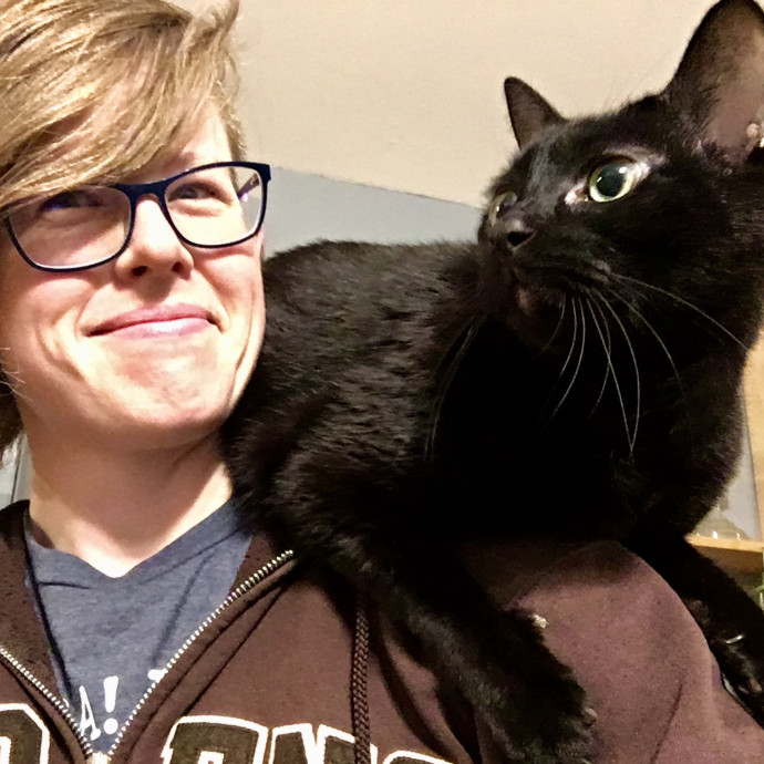 Kit-Kat Sitting By Ash