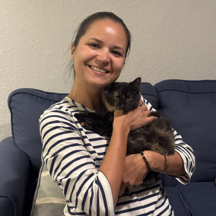 Cat Lover Offering Calm Attentive Care